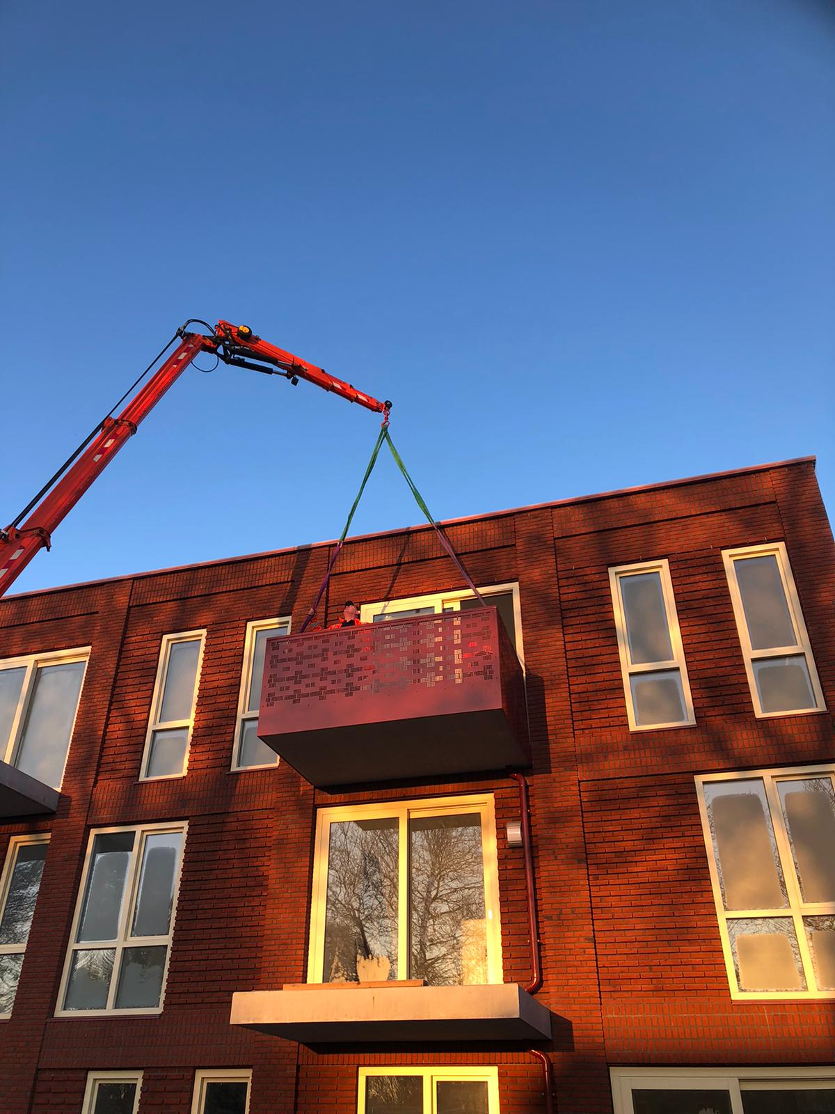 Installation of steel balconies with perforated railing, engineering by Previn Engineering
